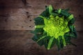 Romanesco broccoli or Roman cauliflower on a rustic wooden board Royalty Free Stock Photo