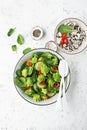 Romanesco broccoli, spinach, cherry tomatoes yellow, hot red pepper pepper salad with wild and basmati rice sauce. The Royalty Free Stock Photo