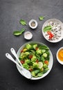 Romanesco broccoli, spinach, cherry tomatoes yellow, hot red pepper pepper salad with wild and basmati rice sauce. The