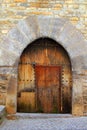 Romanesque arch door wooden medieval Ainsa Royalty Free Stock Photo