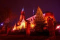 Romanesque brick Catholic church at night Royalty Free Stock Photo