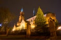 Romanesque brick Catholic church at night Royalty Free Stock Photo