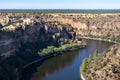 Romanesque church Ermita de San Frutos on top of a hill. Hermitage built in a canyon in the middle of the river DuratÃÂ³n. Dry Royalty Free Stock Photo