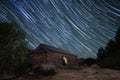 Romanesque Hermitage of Sant Quirc under star trails sky at night Royalty Free Stock Photo