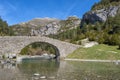 Romanesque stone bridge of Bujaruelo over the ARA river in the valley of Bujaruelo in the Aragonese Pyrenees of Huesca, on a