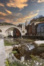 Romanesque stone bridge over the Ter river in Camprodon, Catalonia. Empty copy space Royalty Free Stock Photo