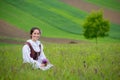 Romania beautiful girl and traditional costume in summer time