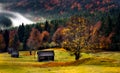 Romania beautiful landscape , autumn in Bucovina with shepherd houses Royalty Free Stock Photo