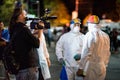 Romania, Bucharest - August 11, 2018: Protesters wearing derating costumes are interviewed by media