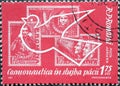 Romania - Circa 1962: a postage stamp printed in the Romania showing an airmail stamp for an exhibition: Dove and spacemen stamps Royalty Free Stock Photo