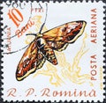 Romania - Circa 1960 : a postage stamp printed in the Romania showing a butterfly Giant Peacock Moth Saturnia pyri