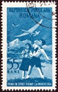 ROMANIA - CIRCA 1953: A stamp printed in Romania shows boy and girl flying model gliders, circa 1953.