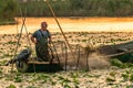 ROMANIA, DANUBE DELTA, AUGUST 2019: Net fishing in the Danube Delta Royalty Free Stock Photo