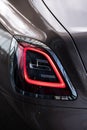 Detail view of the rear break LED lights of a Rolls Royce Ghost. Premium luxury car.