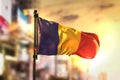 Romania Flag Against City Blurred Background At Sunrise Backlight Royalty Free Stock Photo