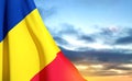 Romania flag against the sunset. Patriotic background Royalty Free Stock Photo