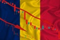 Romania flag, the fall of the currency against the background of the flag and stock price fluctuations. Crisis concept with Royalty Free Stock Photo