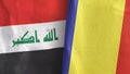 Romania and Iraq two flags textile cloth 3D rendering