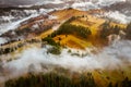 Romania landscape on a foggy autumn morning in Fundata, Brasov on the Rucar Bran pass. Royalty Free Stock Photo
