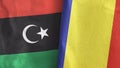 Romania and Libya two flags textile cloth 3D rendering