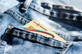 Romania -May 17,,2020 : BT Banca Transilvania plastic card in the back pocket of jeans . Concept of savings, during the