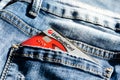 Romania -May 17,,2020 :UniCredit plastic card in the back pocket of jeans . Concept of savings, during the financial crisis or