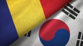 Romania and South Korea two flags textile cloth, fabric texture