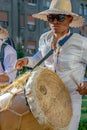 Young drummer from Colombia in traditional costume
