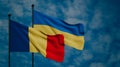 Romania and Ukraine flags. Romania vs Ukraine. dark Blue sky and flag Romania and Ukraine. 3D work and 3D image Royalty Free Stock Photo