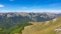 Romania, Valcan Mountains, viewpoint to Retezat Mountains from Oslea Ridge.