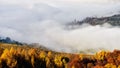 Romania wild Carpathian mountains with mist in the autumn time landscape Royalty Free Stock Photo