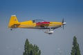 Aeroclub of Romania performing aerial acrobatics at BIAS 2023, Extra 330SC plane.