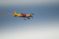 Aeroclub of Romania performing aerial acrobatics at BIAS 2023, Extra 330SC plane.