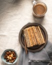 Romanian Cake with layers filled with cream made from walnuts