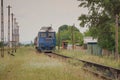 Romanian CFR old commuter train with a blue locomotive