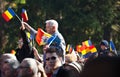 Romanian crowd waving flags