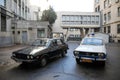 Romanian Dacia cars, one black used by the former communist Securitate and one used by the former Militia police