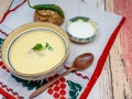 Romanian dish tripe soup with hot peppers, sour cream and bread Royalty Free Stock Photo