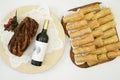 Romanian Easter Bread- Cozonac with wine on the side. A wooden board full of Moldovian Romanian pies Royalty Free Stock Photo