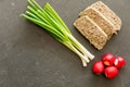 Romanian easter food dish lamb tripe stuffed with mincen lamb organs and fresh green onion and radishes with copy space Royalty Free Stock Photo