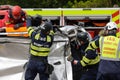 Romanian first responders, firefighters and paramedics, train to extricate and save the victim of a motorcycle accident during a Royalty Free Stock Photo