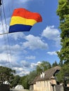 The Romanian flag flies in a Saxon village in Transylvania Royalty Free Stock Photo