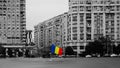 Romanian flag standing out in a black and white photography