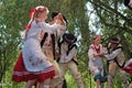 Romanian folk dancers in traditional costumes