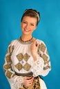 Romanian folklore clothes traditional on blue azzure background Royalty Free Stock Photo