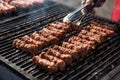 Romanian food, grilled meat rolls called mititei or mici Royalty Free Stock Photo