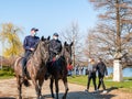 The Romanian Gendarmerie on horses wearing face masks in Herestrau Park. Police on patrol