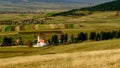 Romanian landscape in the hart of Transylvania with medieval church Royalty Free Stock Photo