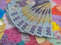 Romanian 100 Lei banknotes on a map of Romania Royalty Free Stock Photo