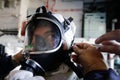 Romanian man using a firefighter mask